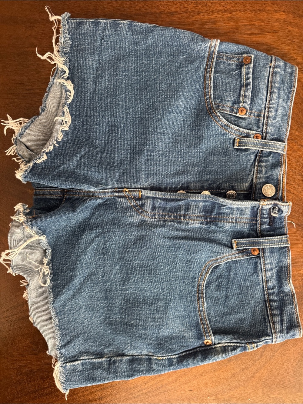 Levi's Distressed Light Blue Frayed Hem Jean Shorts